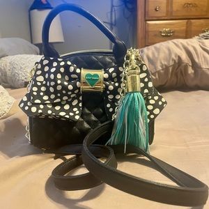 Small Betsy Johnson bow bag in great used condition
